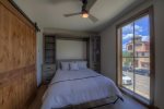 A plush queen sized Murphy bed is located in the first bedroom 
